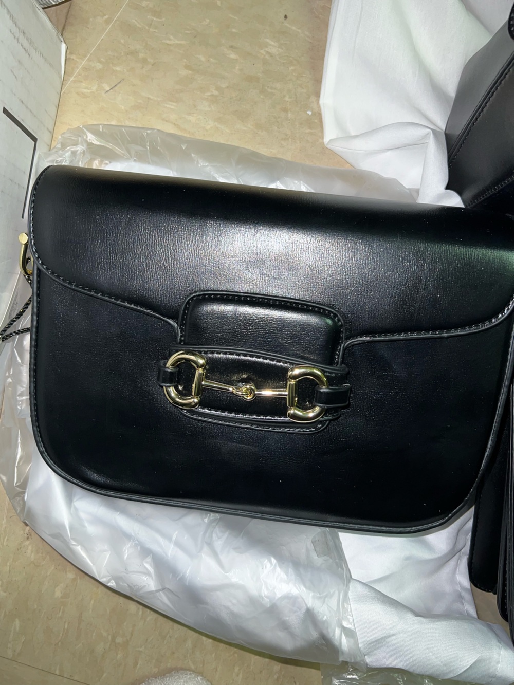Black Leather Women’s Saddle Bag with Gold Hardware